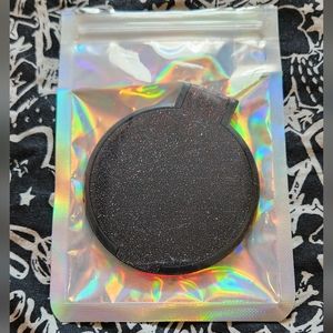 Free compact mirror with any purchase